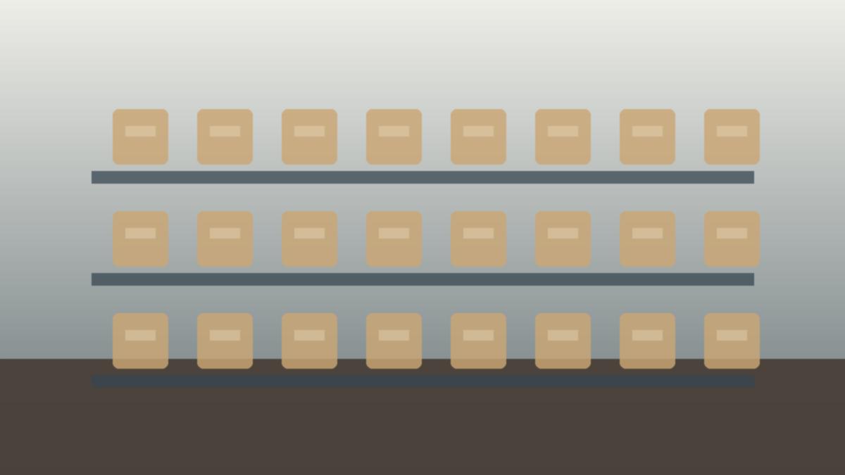 A tidy stockroom with boxes systematically arranged on metal racks, demonstrating proper stock management and retail inventory aging prep.